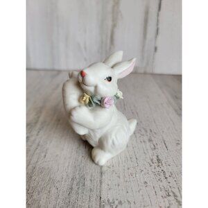 White ceramic rabbit carrot Easter Bunny flowering